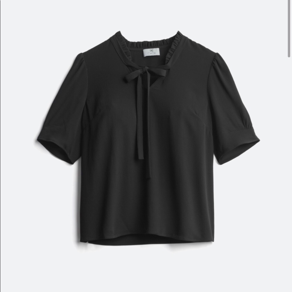 CeCe black blouse with Crepe material. New with tags - never worn!